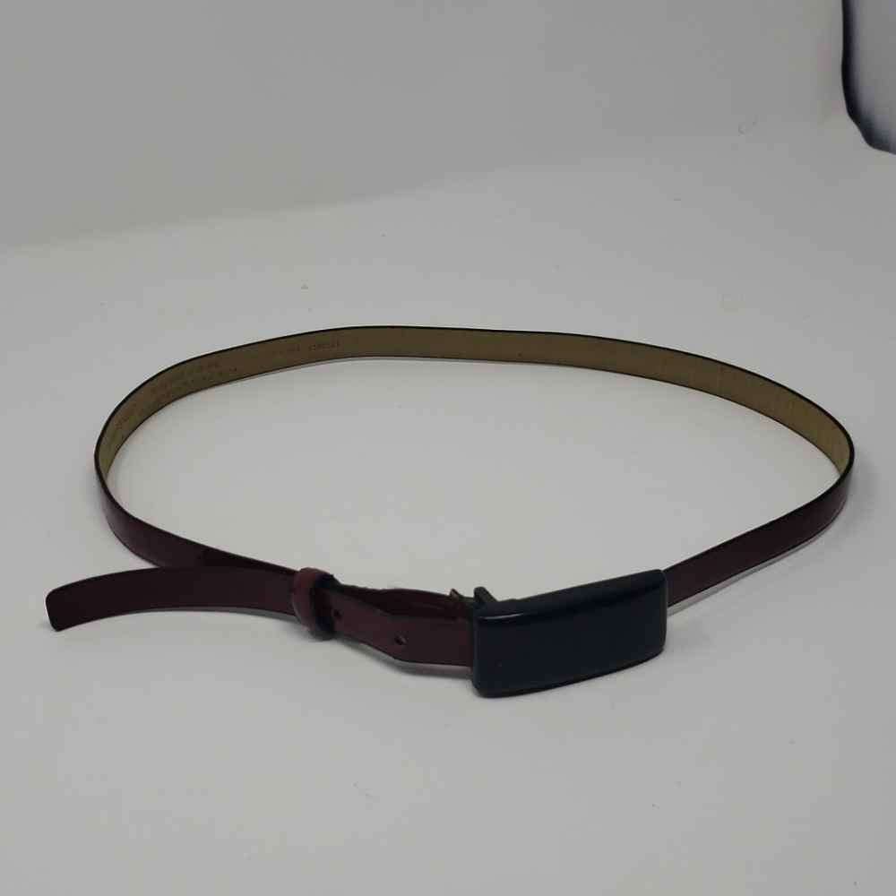 Thin, dark red belt
